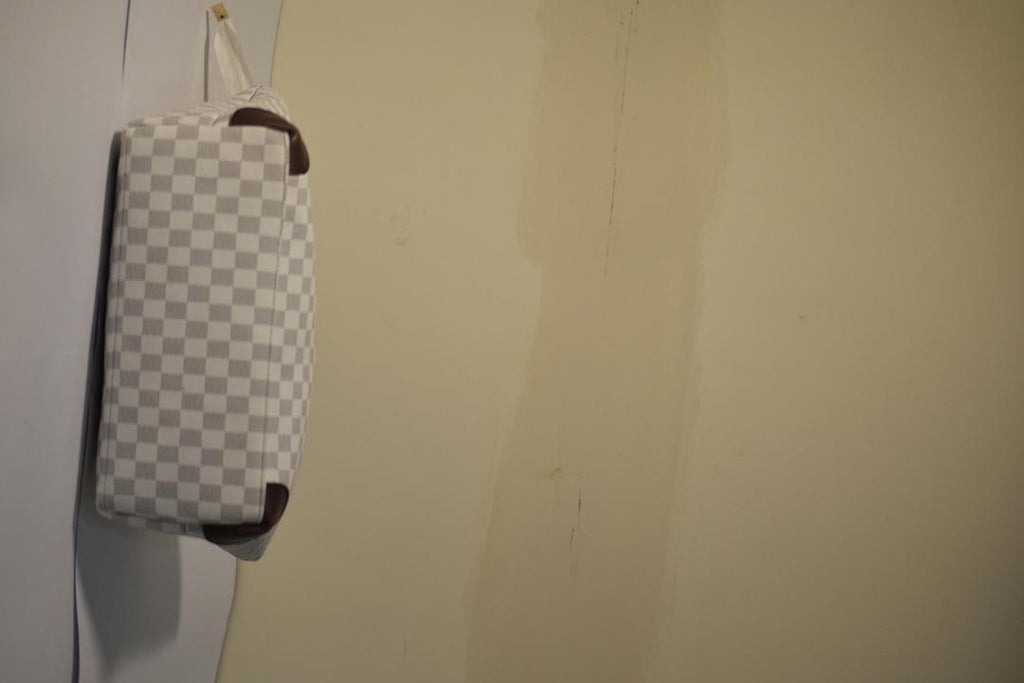 Crafted from high-quality PU leather, this printed shoulder bag combines durability with style