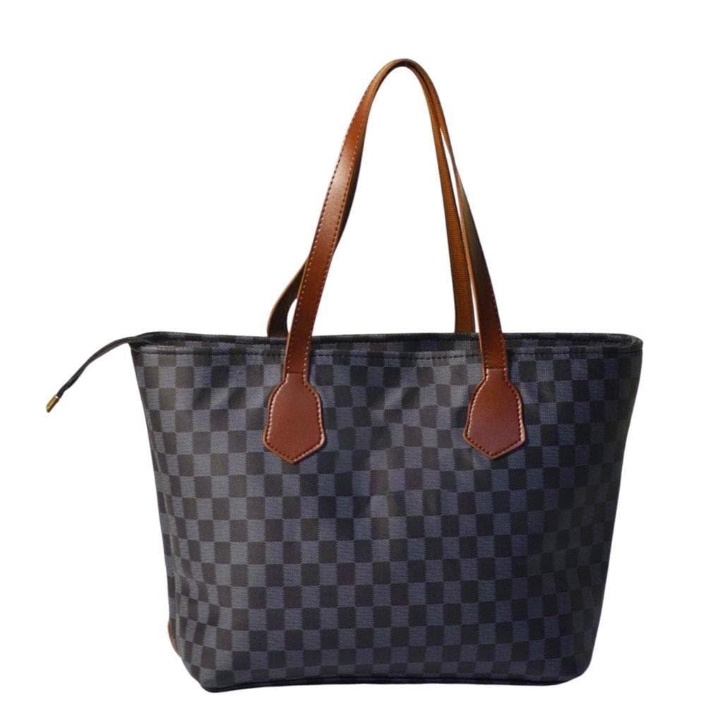 Crafted from high-quality PU leather, this printed shoulder bag combines durability with style