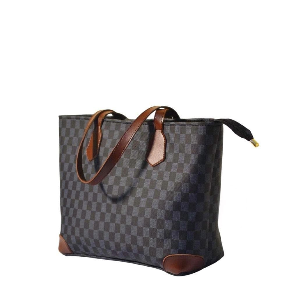 Crafted from high-quality PU leather, this printed shoulder bag combines durability with style