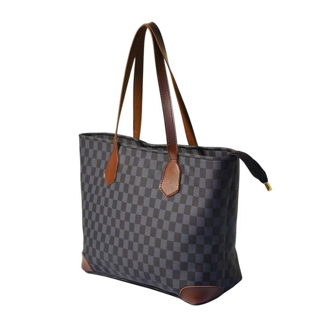 Crafted from high-quality PU leather, this printed shoulder bag combines durability with style